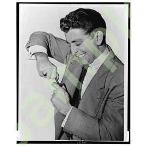  Man wrestles safety razor in television 1951 commercial 