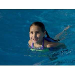  5 Year Old Girl Swimming in Pool, Woodstock, New York, USA 