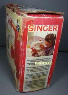 SINGER LOCKSTITCH TOY SEWING MACHINE WITH RED CASE  