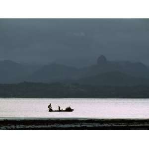 Evening Calm Ushers a Fishing Boat Past a Reef Off Viti Levu Island 