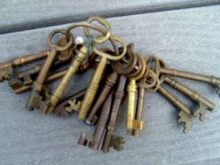   DIFFERENT SIZE ANTIQUE KEYS ON AN ANTIQUE RING   FROM BOSTON MA  