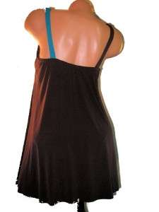 An innovative new look from Magicsuit, this two tone layered swimdress 