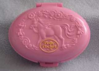 From pet and smoke free home. We are listing more Polly Pocket, and 