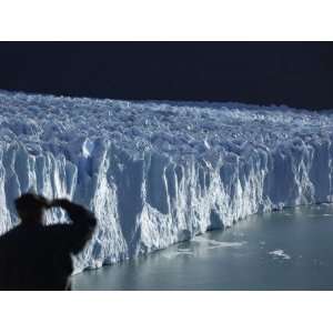  Looks Out at the Perito Moreno Glacier as it Descends into Argentino 