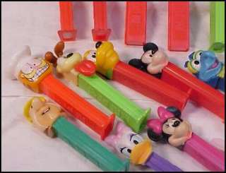 PEZ LOT~HOLIDAY~LOONEY TOONS~DISNEY~MUPPETS~GARFIELD +  