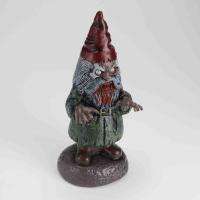 The gnome is made of plastic. It measures approx. 16.5 inches in 