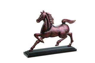 This hammered metal horse statue makes a beautiful addition to any 