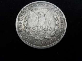   ARE BIDDING ON A 1885 MORGAN SLVER DOLLAR COIN MINTED IN CARSON CITY
