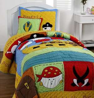 Adorable pirate bedding in a little boys bedroom