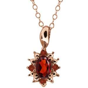  0.63 Ct Oval Red Garnet and Cognac Red Diamond 14k Rose 