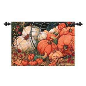 creates a colorful scene of fall with pumpkins, leaves and dried fall 