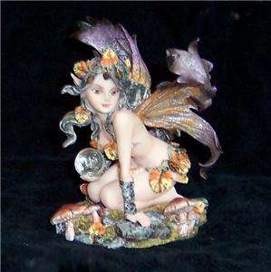 Little Vixen Fairy Holding Glass Ball Fairy Figurine  