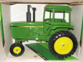 Up for sale is a 1/16 JOHN DEERE 4450 tractor with green cab. New in 