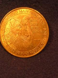 North Shore Animal League coin. Celebrating 31 years of saving animals 