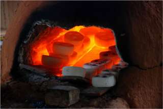   and powdered glass is put intomolds, which are then fired in ovens