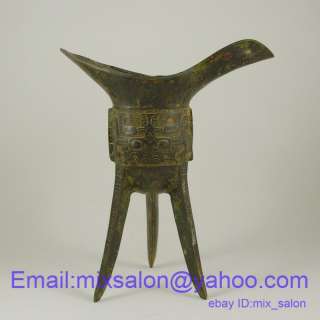   Chinese Bronze Jue Tripod Cup Bull Head Vessel With Beast Design